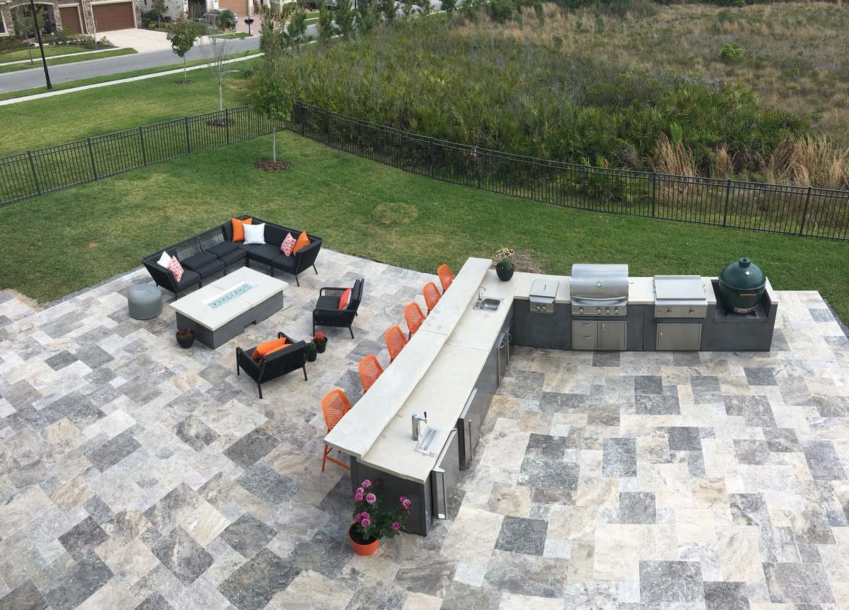 Concrete Bomb Shelter outdoor kitchen beside a pool in Florida