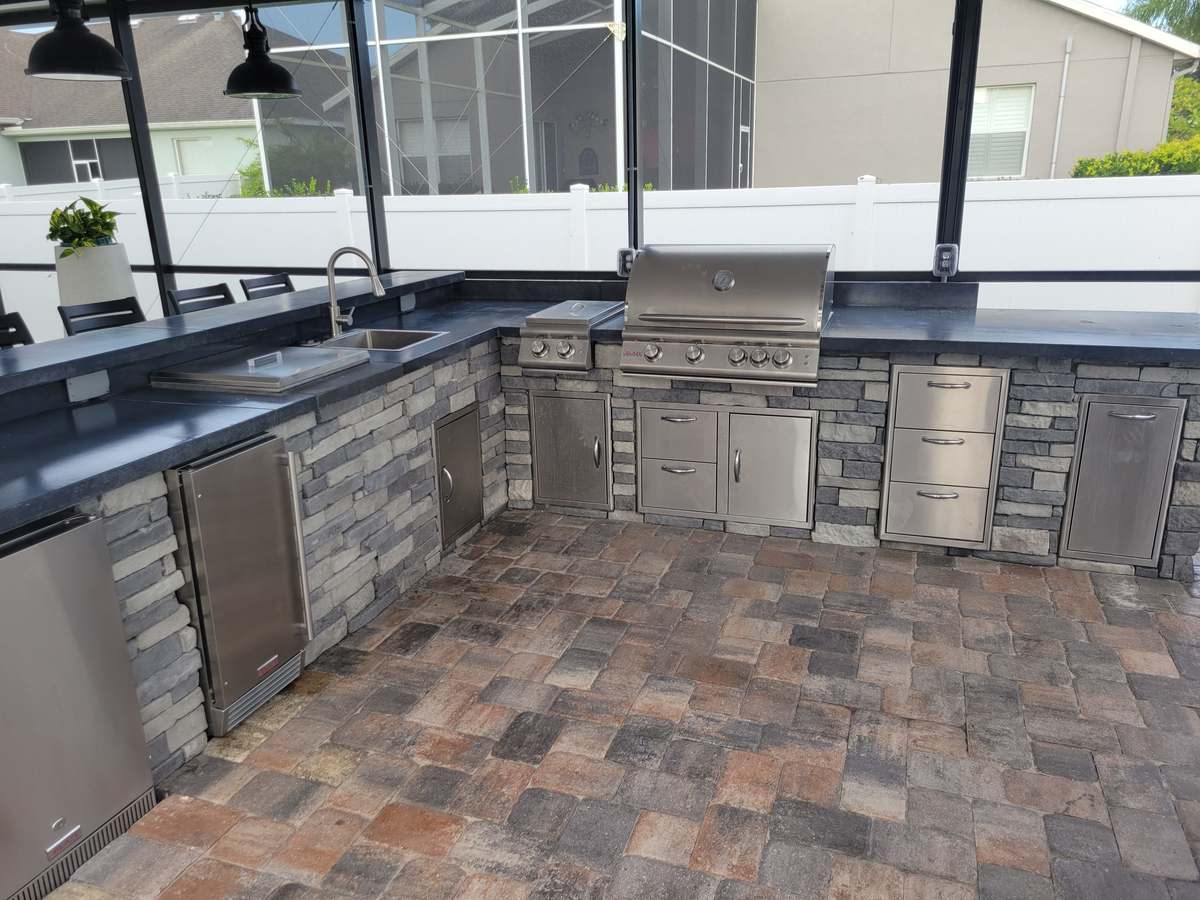 Waterfront concrete outdoor kitchen